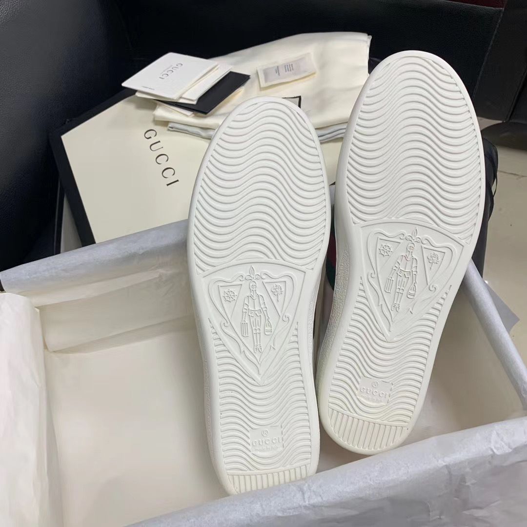 Gu*** Snake Sneakers