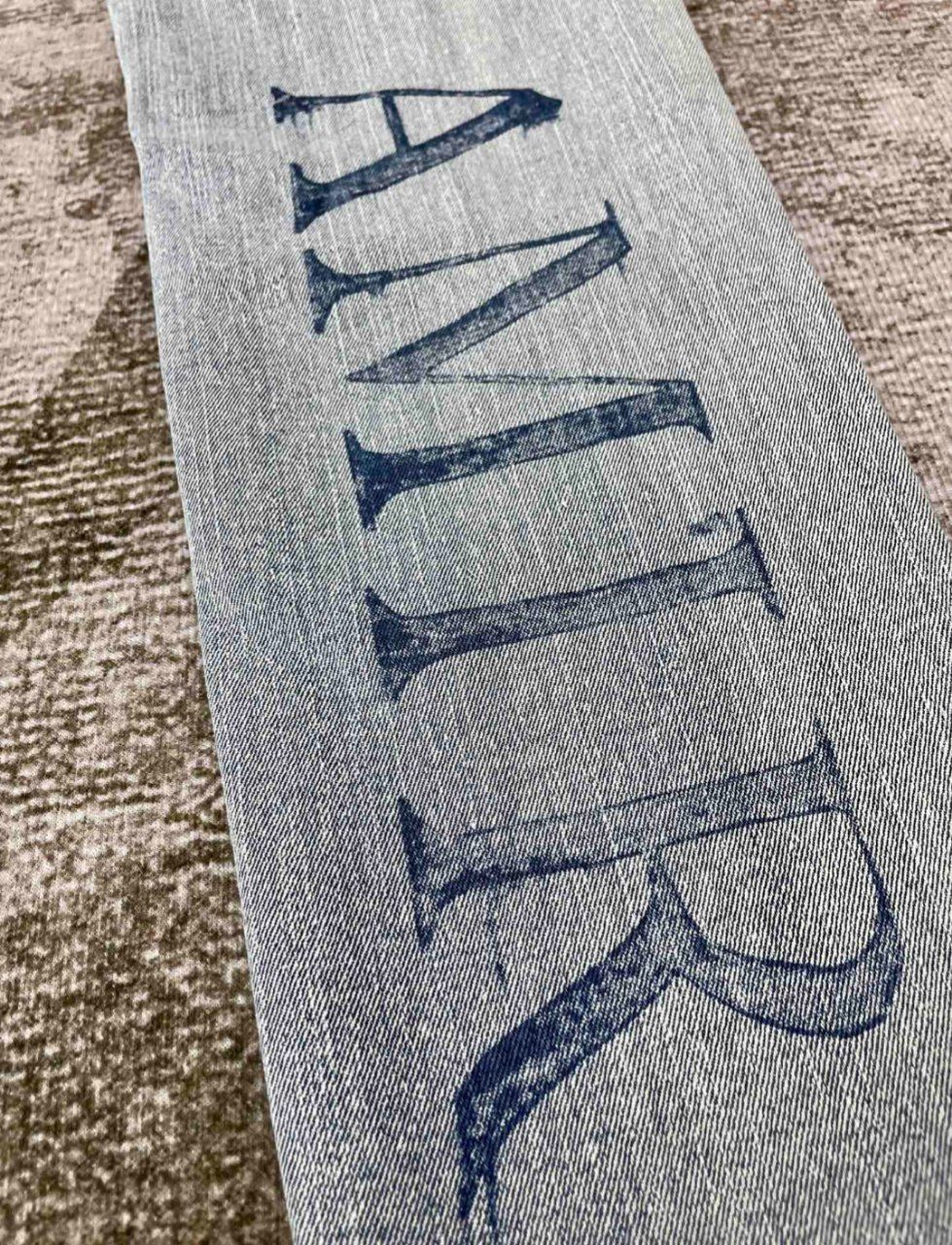 Am*** Jeans Ripped Logo